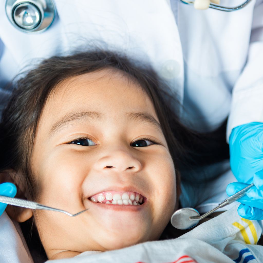 kid getting ready for tooth extraction